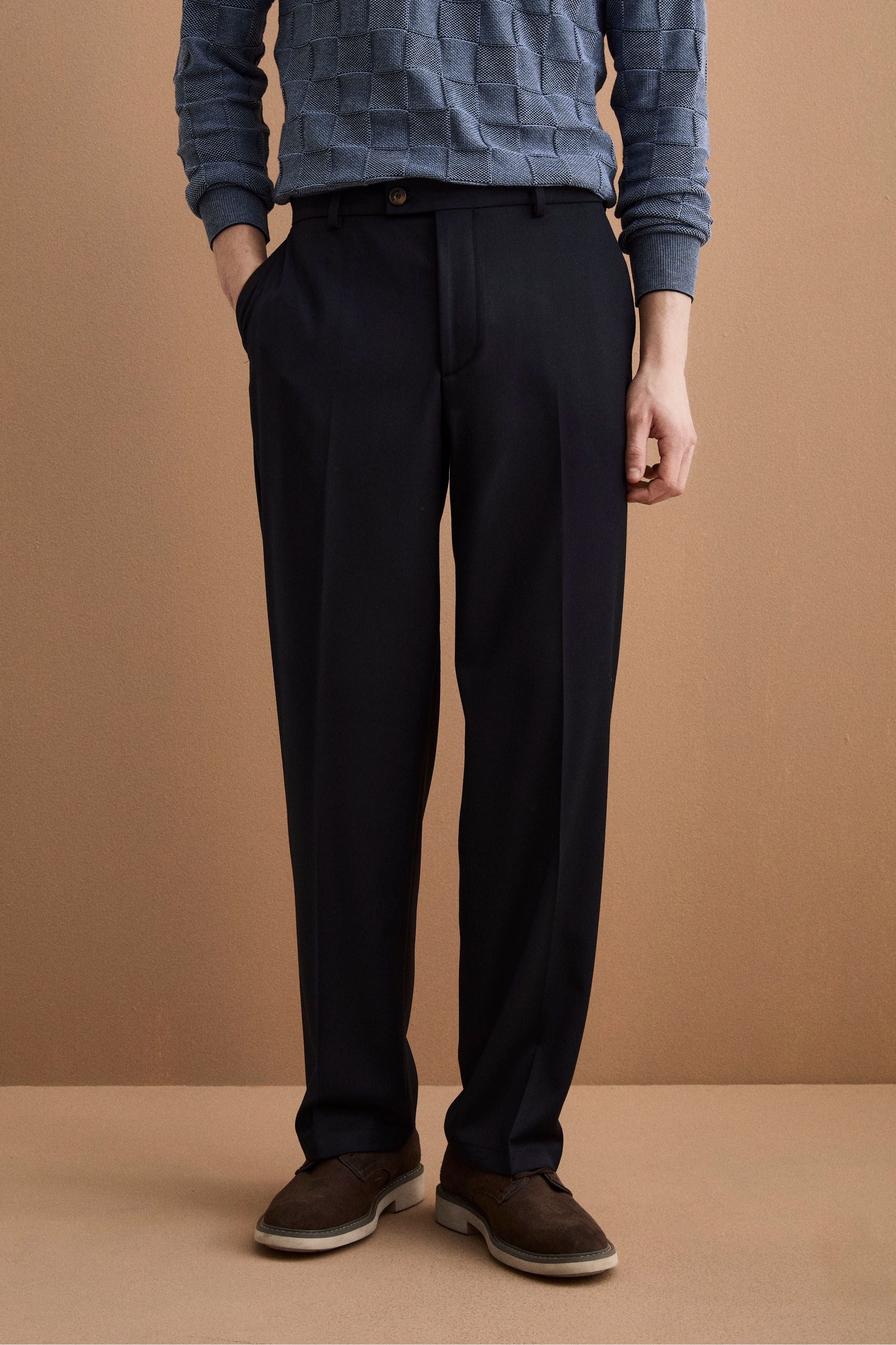 Weite Hose aus Wollmischung mit Bundfalten - -