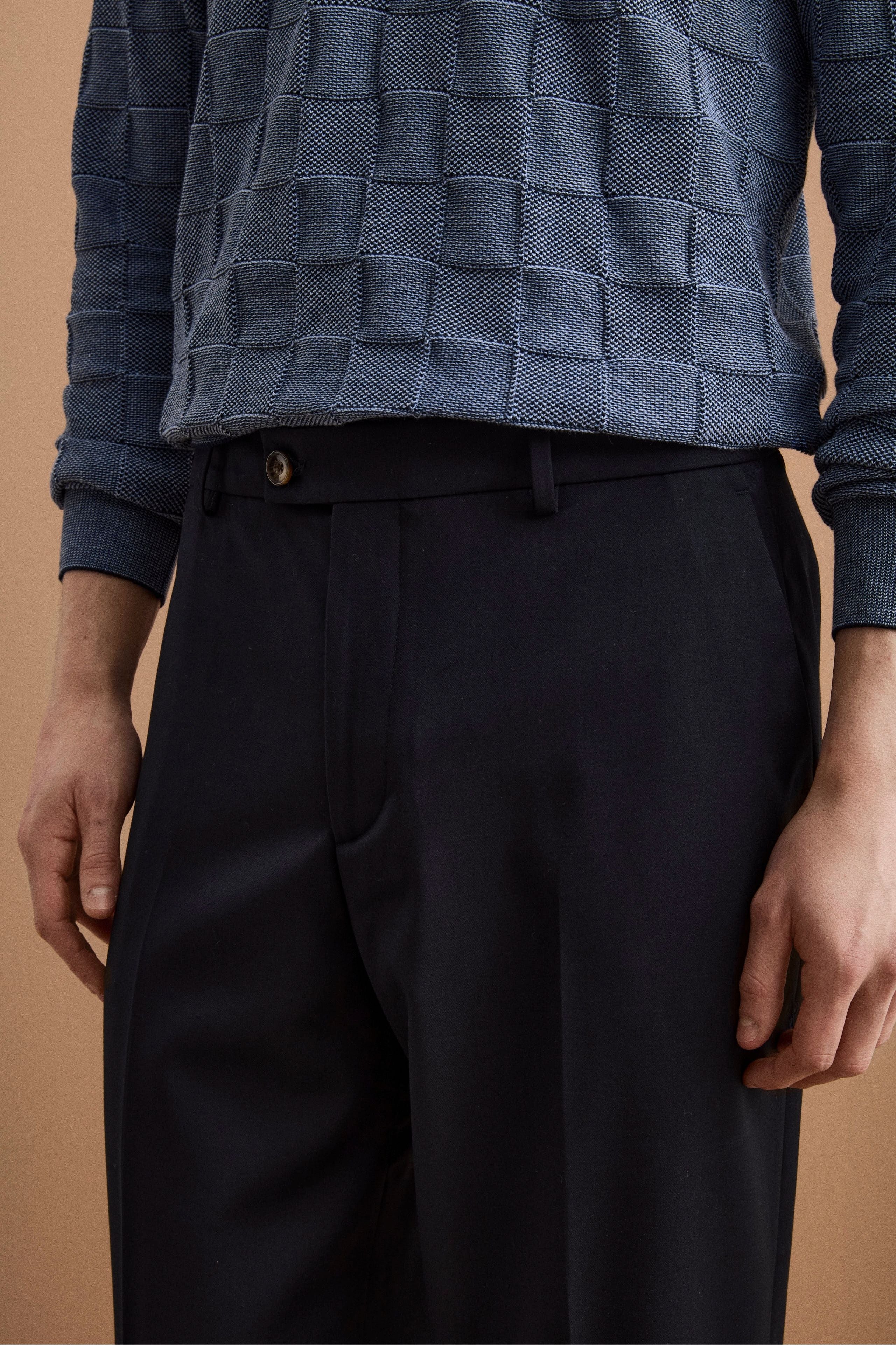 Weite Hose aus Wollmischung mit Bundfalten - -