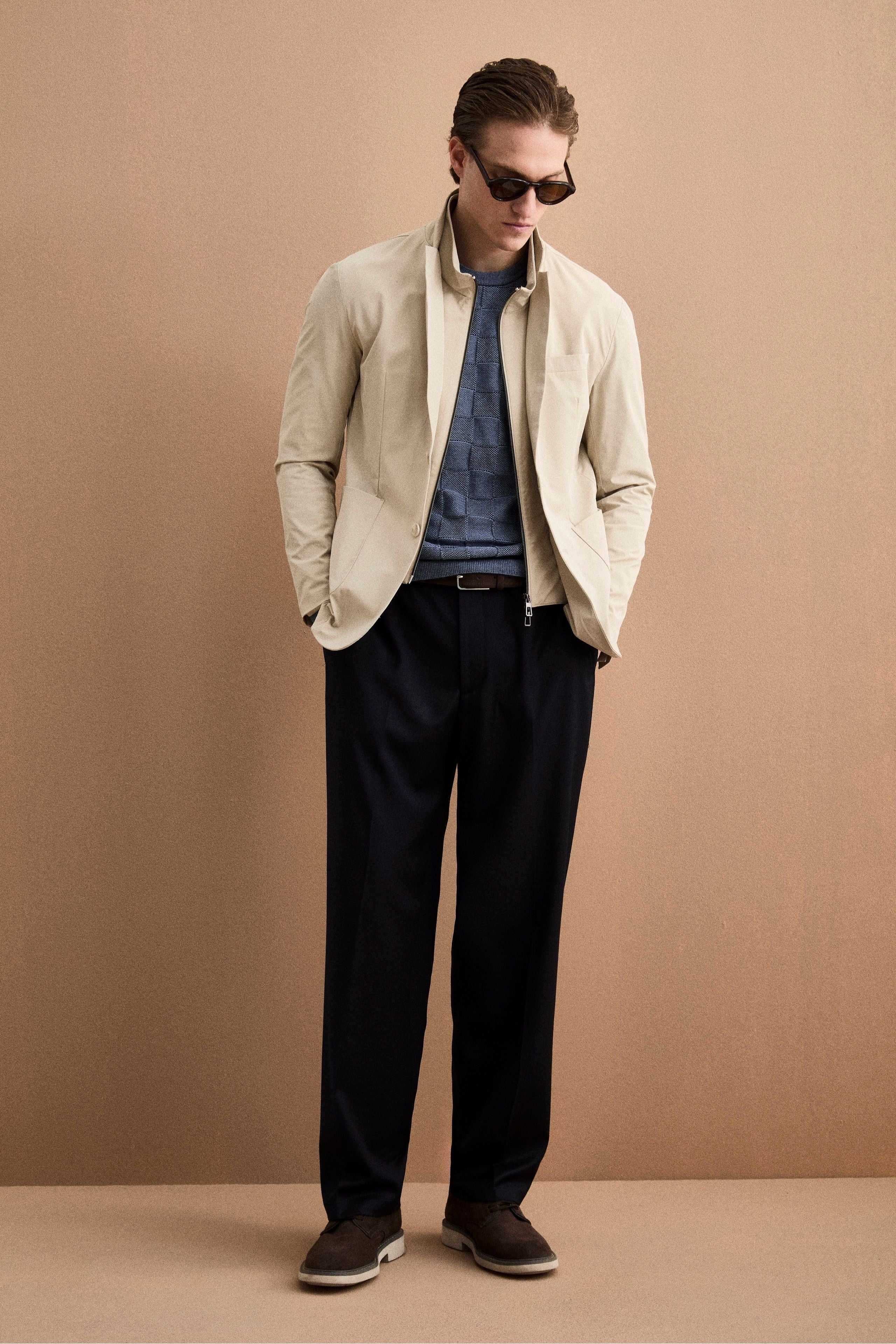 Weite Hose aus Wollmischung mit Bundfalten - -