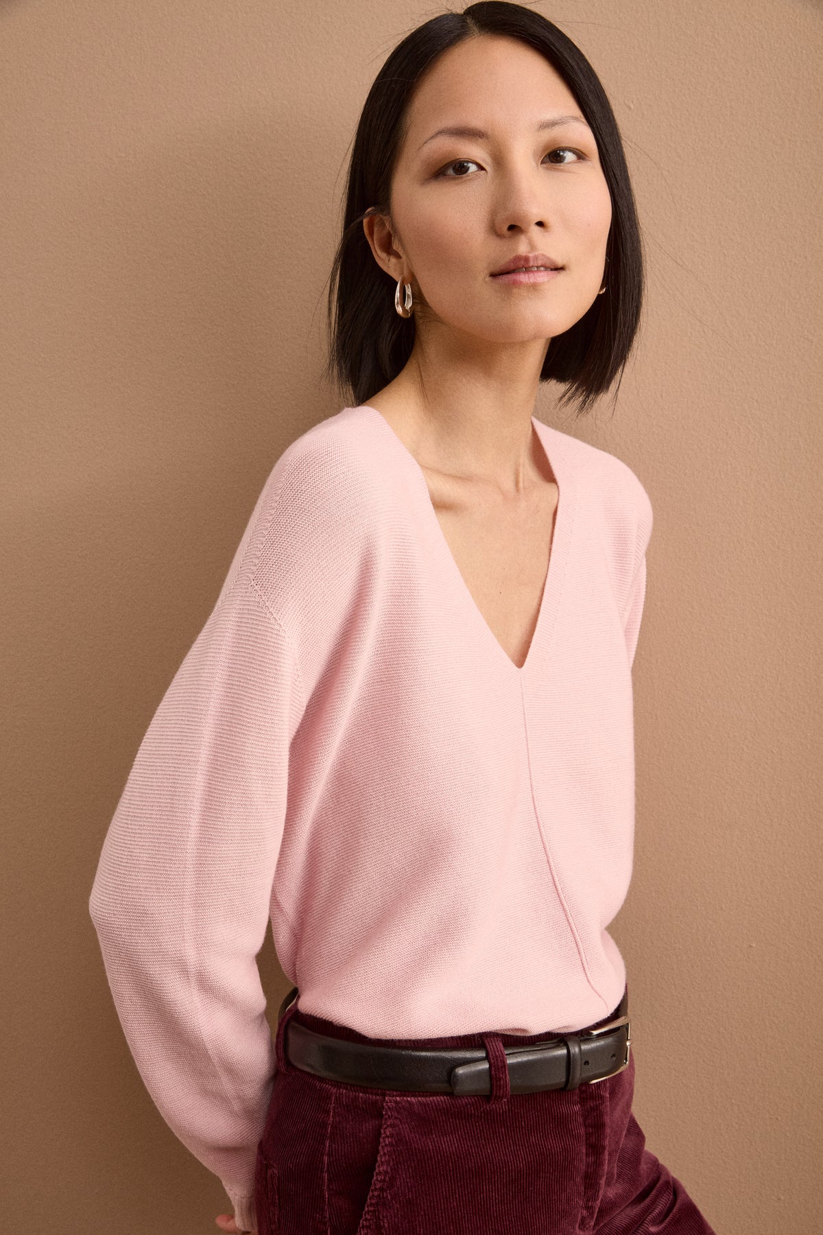 Oversize-V-Ausschnittpullover aus Merinowolle - Rosa