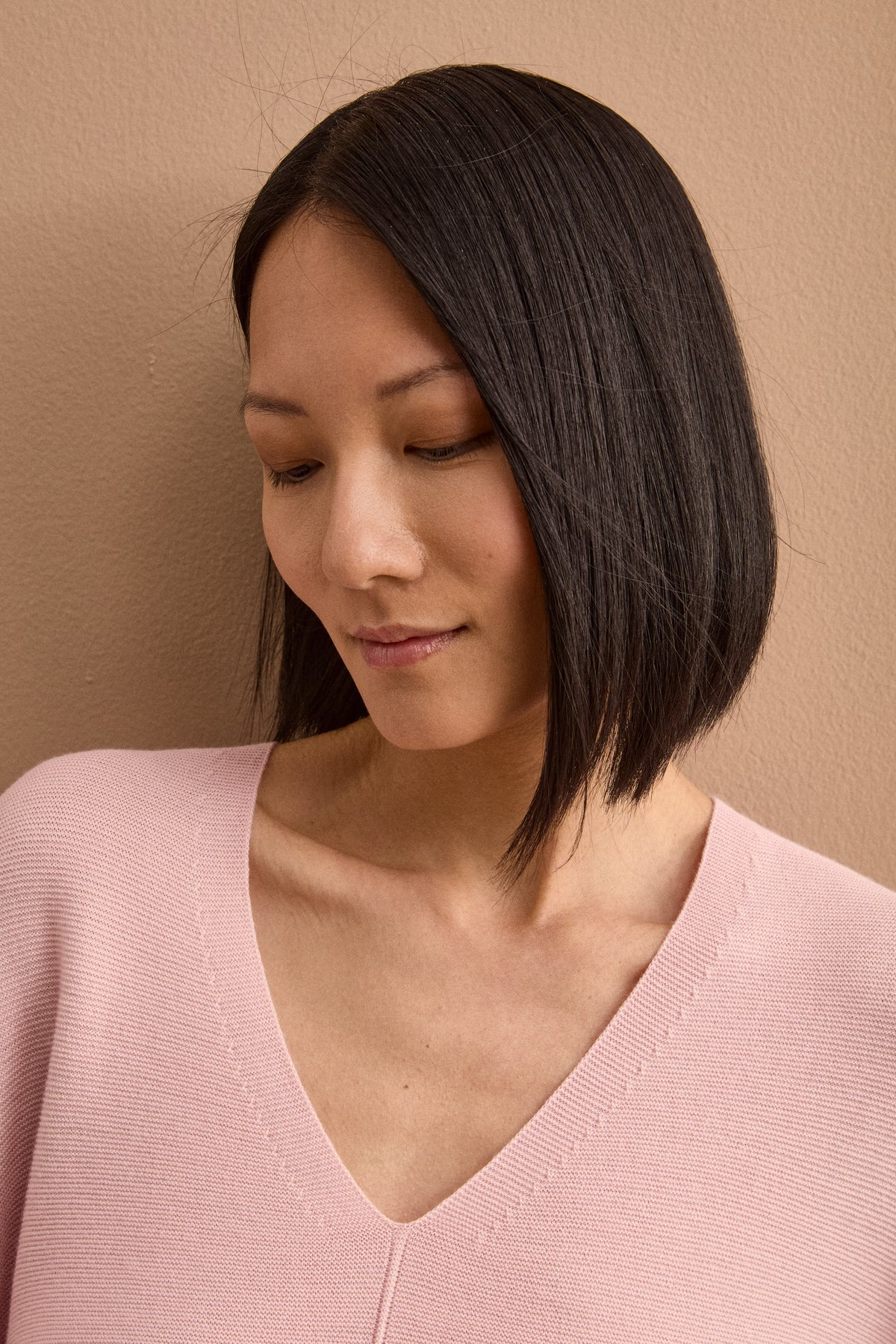 Oversize-V-Ausschnittpullover aus Merinowolle - Rosa