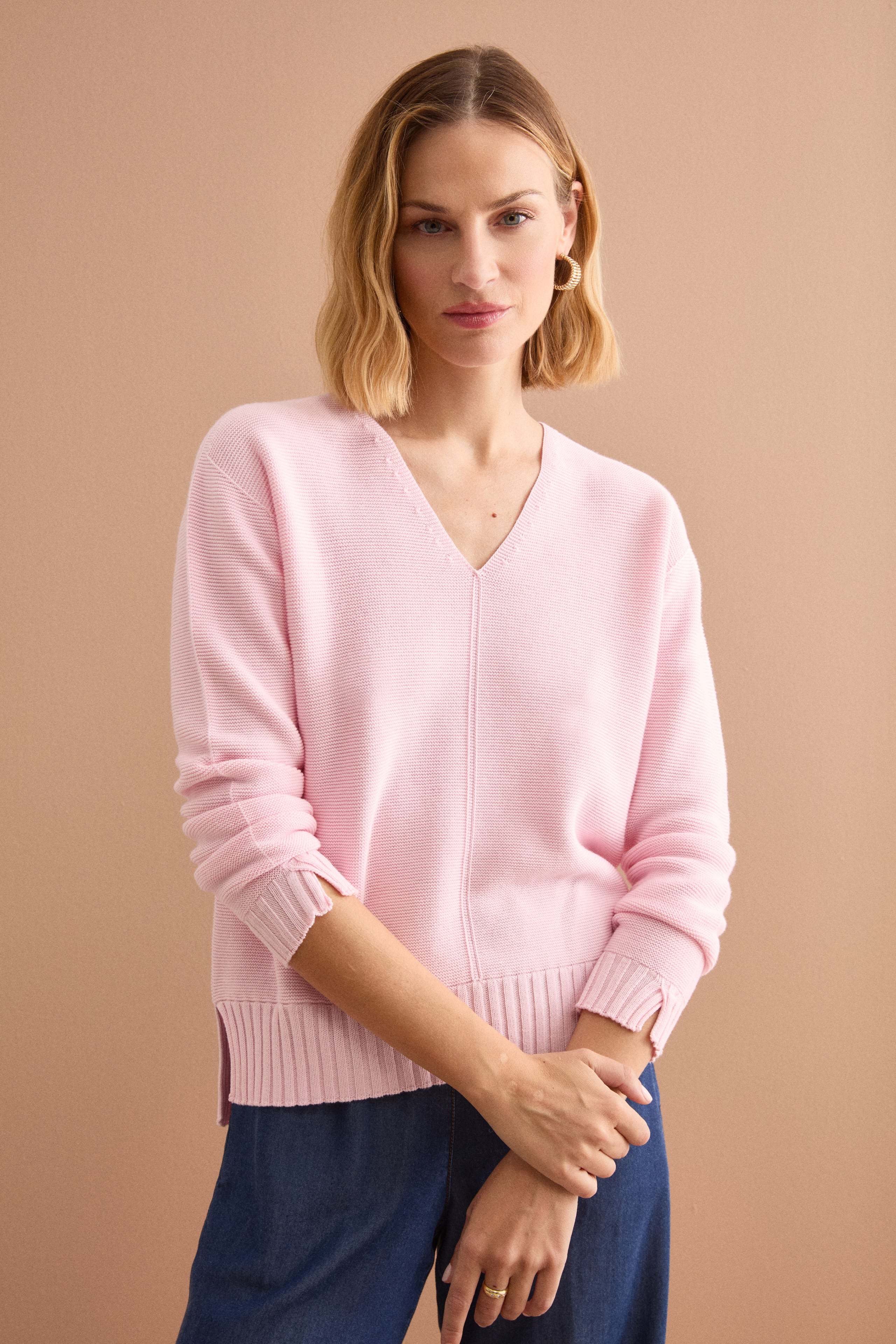 V-Ausschnitt-Pullover mit Rippdetails - Rosa